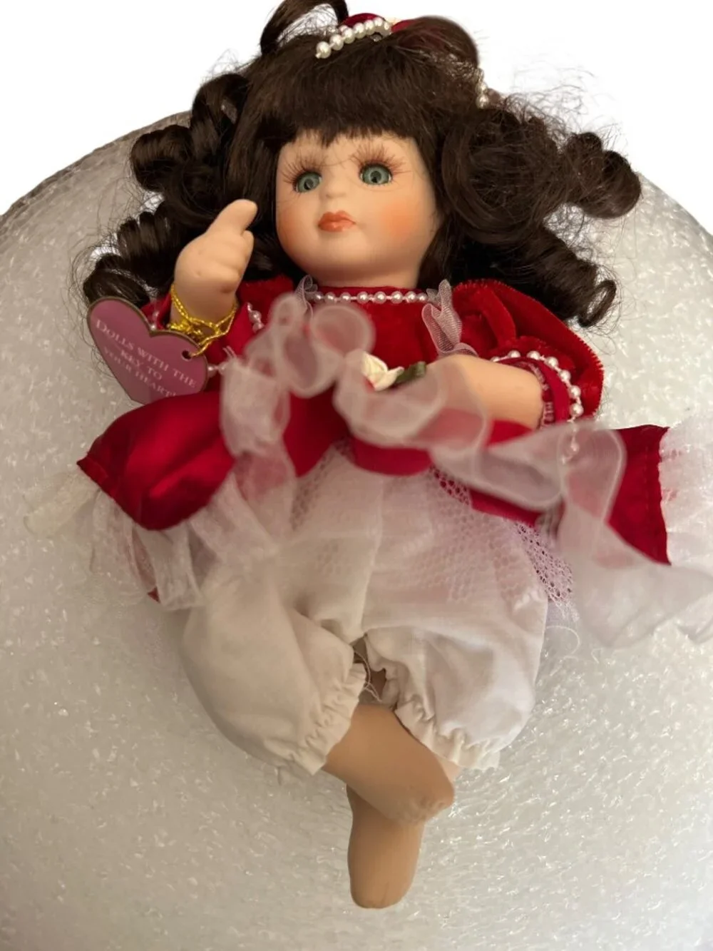 Brass Key Porcelain Doll In Red Dress With Curly Hair Pearl Accents Collectible